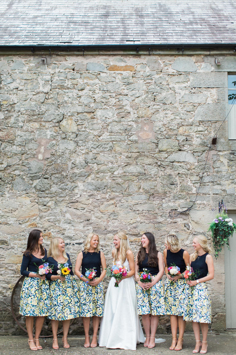 stylish rustic fine art bride and bridesmaids at doxford barns