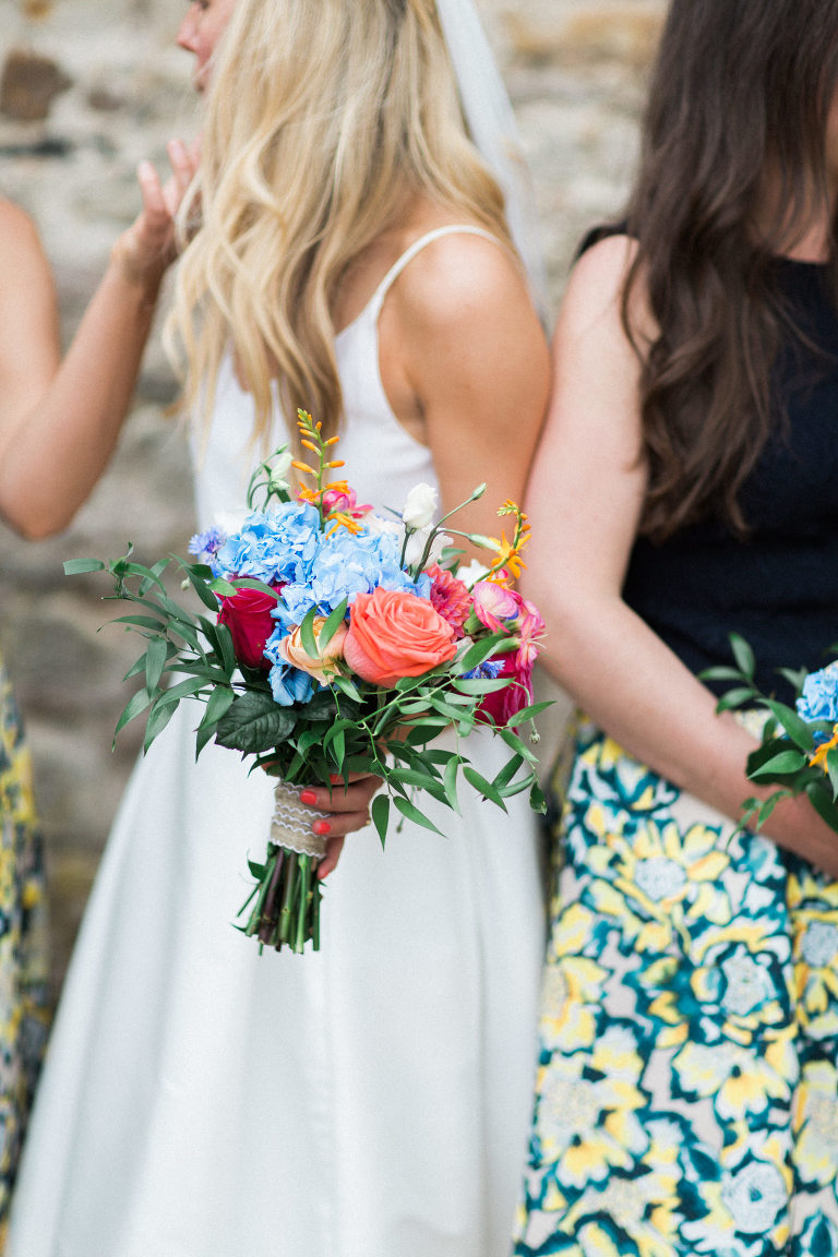 bright and beautiful bouquet for this rustic wedding at doxford barns