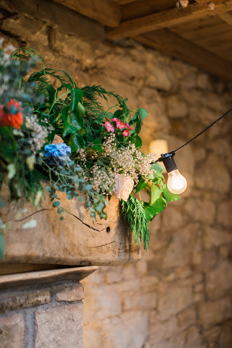 beautiful bright flowers decorate the ceremony room at doxford barns