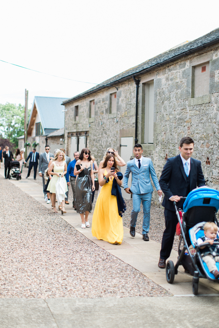guests make their way to the ceremony room at doxford barns